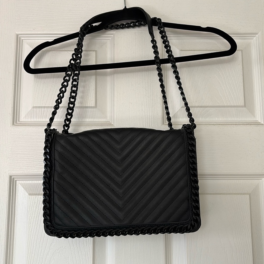 Black Aldo purse with stitching